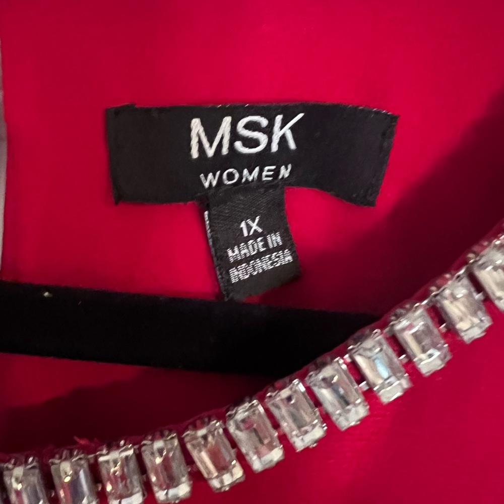 Red blouse with jeweled neckline